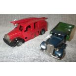 MINIC TOYS: A TIN-PLATE FLAT BED TRUCK, with dark blue cab and green lift and a tin-plate fire