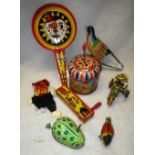 A COLLECTION OF VINTAGE TIN PLATE TOYS to include a clockwork tricycle, and a Japanese frog
