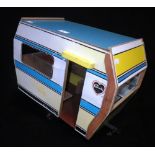 SINDY: A VINTAGE CARAVAN 19" long x 14.5" high Condition: in play-worn condition, some creases and
