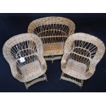 AN EDWARDIAN WICKER THREE PIECE DOLL'S CONSERVATORY SUITE Condition: a few of the rear uprights have