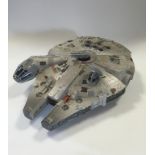 STAR WARS: A Tonka 1995 "Millennium Falcon", two "All Terrain Armored Transporters"(AT-AT), a Kenner