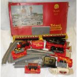 TRI-ANG RAILWAYS: A COLLECTION OF LATE 1950S OO GAUGE ROLLING STOCK, track and packaging (Mainly a