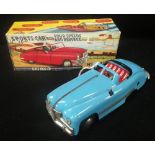 MINIC TOYS: A PALE BLUE SPORTS CAR with four speeds and reverse (No 2 Minic) by Lines Bros Ltd, with