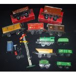 HORNBY: A COLLECTION OF 'O' GAUGE TIN-PLATE ROLLING STOCK, to include, an 'LMS No1 goods van' (