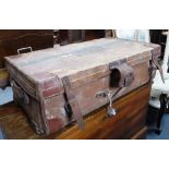 AN EDWARDIAN CANVAS AND LEATHER TRAVELLING TRUNK by Bick Bros, Cheltenham