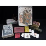 A QUANTITY OF ASSORTED VINTAGE PLAYING CARDS, postcards and other items