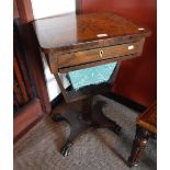 A REGENCY ROSEWOOD AND PARQUETRY WORK TABLE, on animal paw feet, 29" high x 18.35" wide