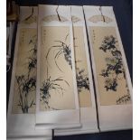 A QUANTITY OF CHINESE SCROLLS decorated with calligraphy and other subjects