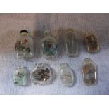 A COLLECTION OF EIGHT CHINESE INTERNALLY DECORATED SNUFF BOTTLES