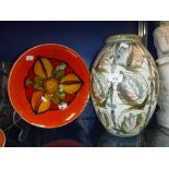 A LARGE DENBY POTTERY VASE and a Poole pottery orange glazed bowl