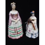 A STAFFORDSHIRE FIGURE OF QUEEN VICTORIA and another similar