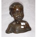 A PATINATED BRONZE BUST OF A YOUNG BOY, inscribed 'J Petermann Fondeur Bruxelles' to the rear 10.