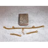 A GOLD COLOURED CHAIN with ball charms, a 10ct gold carbineer clasp and a silver covered bible