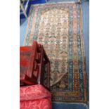 A BROWN GROUND PERSIAN RUG, with all-over geometric decoration 83" long x 42" wide