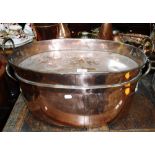 A LARGE 19TH CENTURY COPPER FISH KETTLE, the handled lid with a raised edge 24" wide (including