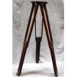 A VINTAGE MAHOGANY PHOTOGRAPHER'S TRIPOD, with brass fittings, stamped ' CROWN TRIPOD No 4, Folmer