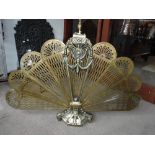 A BRASS FAN FIREGUARD