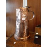 A LARGE COPPER FLAGON with all over decoration and repousse lid, 17" high