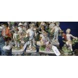 A SMALL COLLECTION OF 'DERBY' GARDENING CHERUB FIGURES and others similar