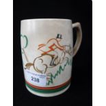 A KEITH MURRAY TANKARD, decorated with a stylised horse and rider jumping a hedge