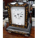 A 19TH CENTURY FRENCH MANTEL CLOCK in an ebonised and marquetry case, the enamel dial inscribed '