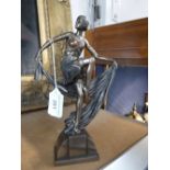 AN ART DECO STYLE BRONZE EFFECT FIGURE OF A DANCING GIRL