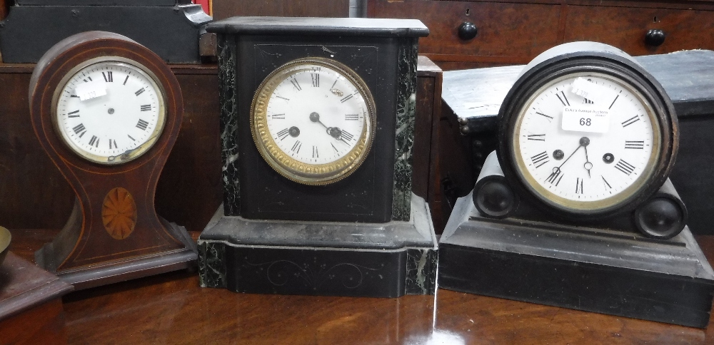 A VICTORIAN MANTEL CLOCK IN AN EBONISED CASE (pendulum in office) and two similar, (movement in
