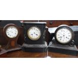 A VICTORIAN MANTEL CLOCK IN AN EBONISED CASE (pendulum in office) and two similar, (movement in