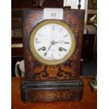 A 19TH CENTURY FRENCH MANTEL CLOCK in a marquetry inlaid rosewood case. (in need of restoration)