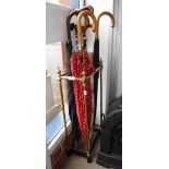 A VICTORIAN STYLE BRASS AND IRON STICK-STAND