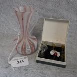 A MURANO STYLE VASE with pink and white spiral decoration and a miniature glass wine ewer with