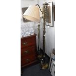 TWO BRASS STANDARD LAMPS and another in wrought iron (3)