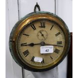 A SHIP'S CLOCK with brass bezel and green painted case