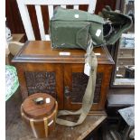 A VICTORIAN OAK SMOKER'S CABINET, a wooden pot and a gas mask (3)