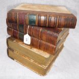 AN ICE BUCKET, in the form of a pile of leather bound books