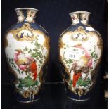 A PAIR OF SAMPSON WORCESTER STYLE VASES painted with exotic birds (drilled to the base)