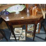 A GEORGE III MAHOGANY FOLD-OVER TOP CARD TABLE with canted corners, 36" wide