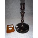 A TURNED AND CARVED ROSEWOOD CANDLESTICK and a wooden snuff box