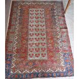 A TRADITIONAL PERSIAN RUG with all-over geometric decoration 73" long x 51" wide