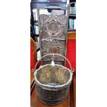 A 19TH CENTURY METAL BOUND BUCKET with iron swing handle and a folding cake stand with carved