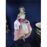 A ROYAL DOULTON FIGURE 'Suzette'