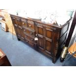 A DARK STAINED ERCOL SIDEBOARD