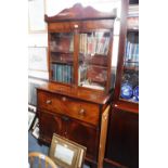 A REGENCY FIGURED MAHOGANY SECRETAIRE BOOKCASE with upper glazed section and doors below 80" high
