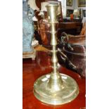 A LATE 17TH/EARLY 18TH CENTURY BRASS CANDLESTICK