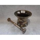 A BRONZE PESTLE AND MORTAR with decorative cast banding