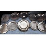 A QUANTITY OF ASSORTED PEWTER PLATES including plates with stamped armorials