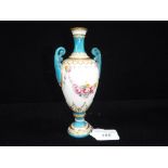 A ROYAL WORCESTER VASE with turquoise glazed handles and neck, with painted floral decoration