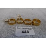 A COLLECTION OF FOUR GOLD RINGS including 22ct yellow gold examples