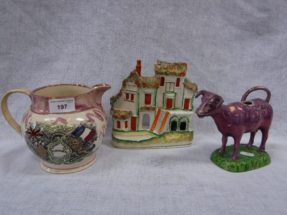 A LUSTRE MUG 'Crimea' a lustre glazed cow creamer and a Staffordshire Cottage