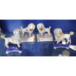 TWO PAIRS OF 19TH CENTURY POODLE ORNAMENTS, on pink and blue cushion bases